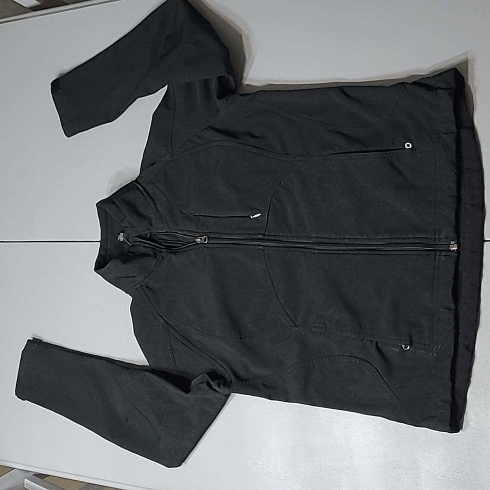 Kirkland  signature woman's full zip jacket  soft shell utility jacket.